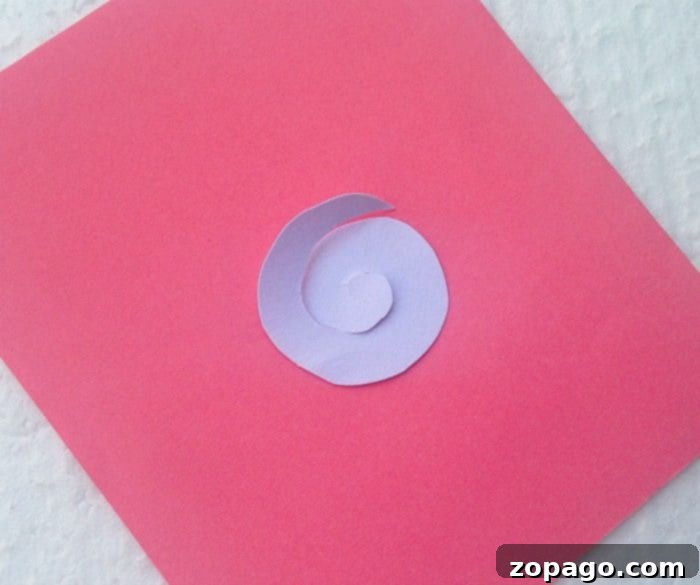 Create a Beautiful Pop Up Heart Card 2 Two pop up heart cards displaying different color combinations and paper flower arrangements