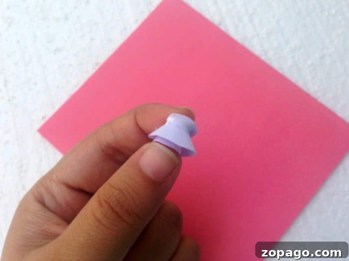 Create a Beautiful Pop Up Heart Card 5 Close-up of a perfectly rolled paper flower bud, ready for gluing on a pop up card