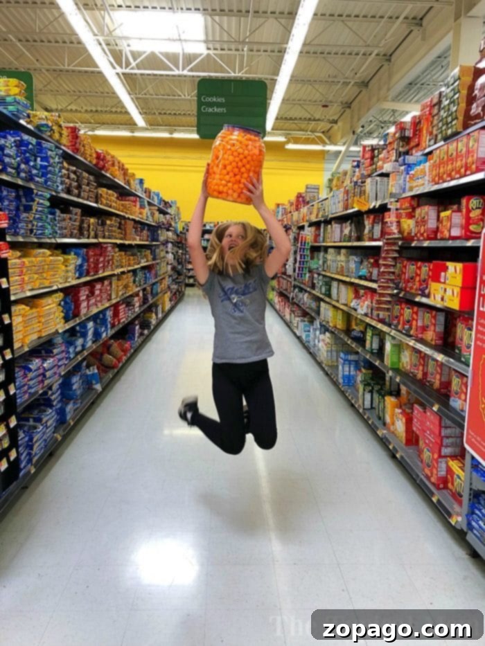 Supermarket Scramble 5 Energetic child playfully posing inside a shopping cart during grocery shopping