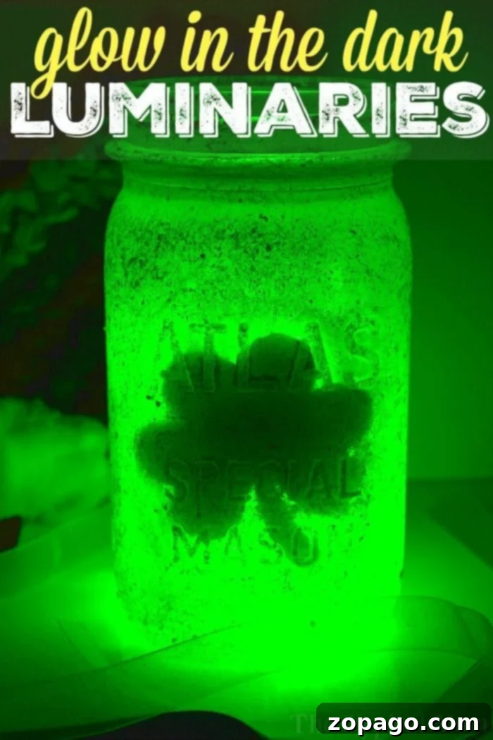 Discover the joy of creating glowing mason jar luminaries – a fun, inexpensive craft for kids, perfect for any holiday or as a DIY nightlight. Two glowing green mason jar luminaries with shamrock designs, perfect for St. Patrick's Day or general decorative use.