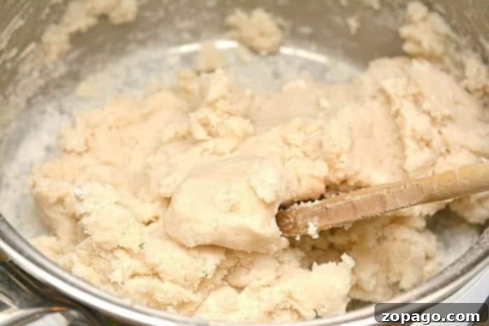 This is how you make soft scented playdough using essential oils and natural ingredients in your cupboards! It's a fun way to make homemade playdoh that smells wonderful and is a fun activity for toddlers and kids of all ages really. A simple and cheap Preschool craft or weekend activity. #scented #playdough #playdoh #homemade #recipe #easy #vanilla #essentialoil #lavender #scent Scented Playdough 4