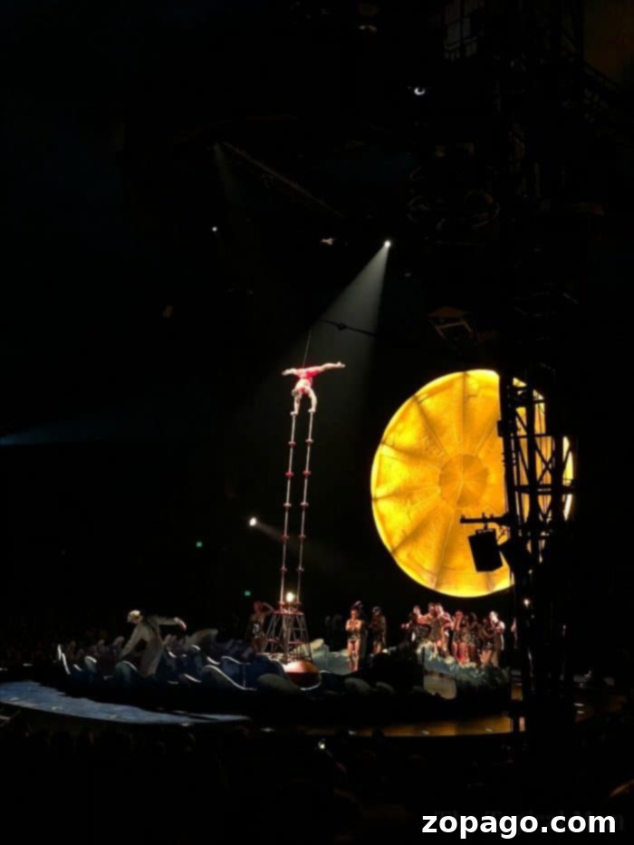 Thrilling hoop diving at Cirque du Soleil Luzia An acrobat performs a mesmerizing hoop diving act, showcasing incredible agility and precision.