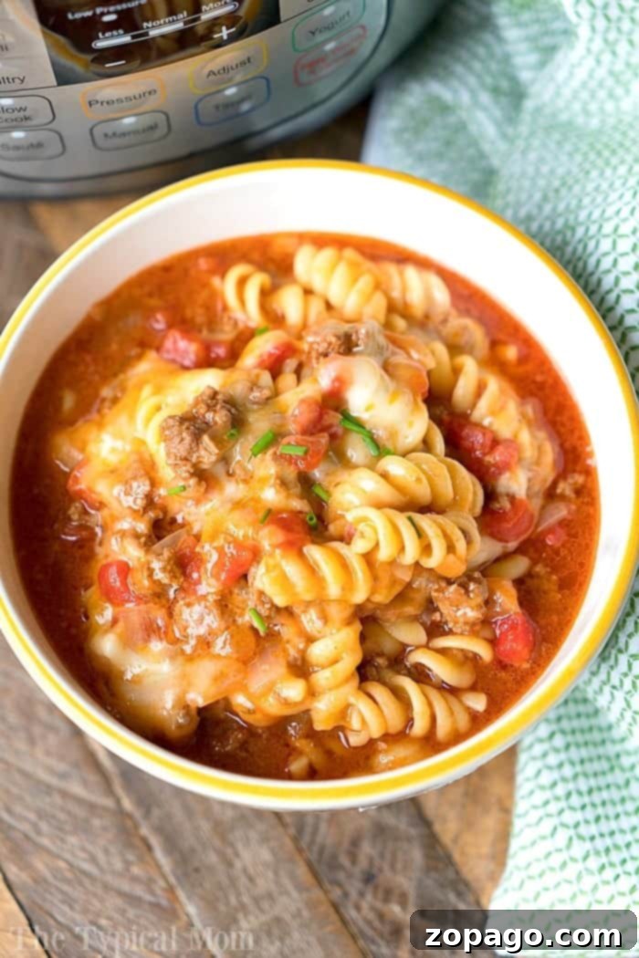 Instant Pot Taco Casserole: A flavorful, cheesy ground beef and pasta meal, made quickly in the pressure cooker for a satisfying family dinner. Delicious and cheesy Instant Pot Taco Casserole, a quick and easy ground beef pasta dish perfect for dinner.