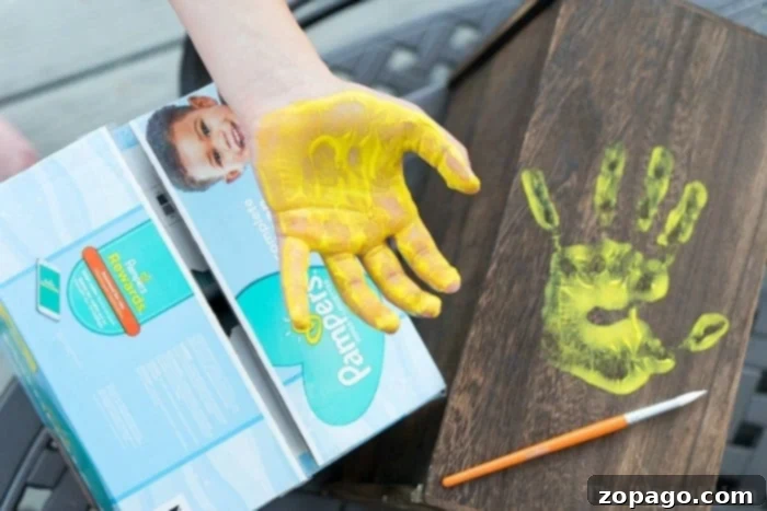 Perfect Presents for Amazing Educators 3 Close-up of a child's hand painted with red paint for a handprint art project