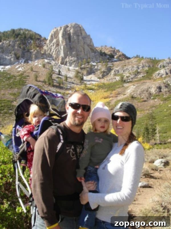 Heartfelt advice and reflections I wish I had as a new mom. Embrace the messy, unpredictable, and joyous path of parenting. #momlife #parenting #newmom #advice #blogger #motherhoodunfiltered Candid photo of a mother with two young daughters, illustrating the beautiful, challenging journey of motherhood