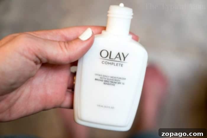 The Mother Behind the Veil 2 Olay Complete All-Day Moisturizer SPF 15, a daily essential for sun protection.