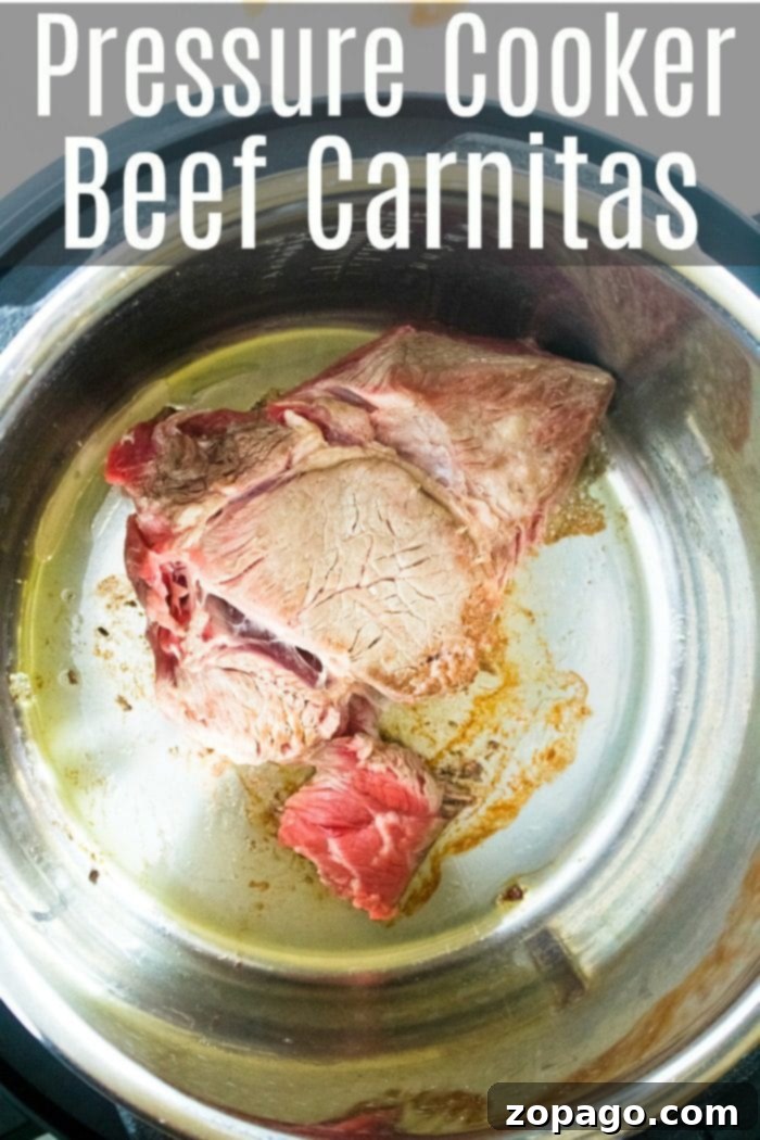 Here's an easy pressure cooker shredded beef tacos recipe you can make for dinner tonight! Flavorful tender beef in your Instant Pot has never been easier! #pressurecooker #instantpot #shredded #beef #tacos #healthy #easy Pressure Cooker Shredded Beef - Ready to serve