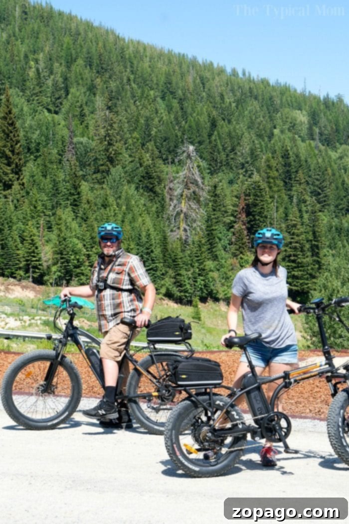 Mountain bikers enjoying the trails at Schweitzer Resort. Mountain biking on a scenic trail at Schweitzer Resort