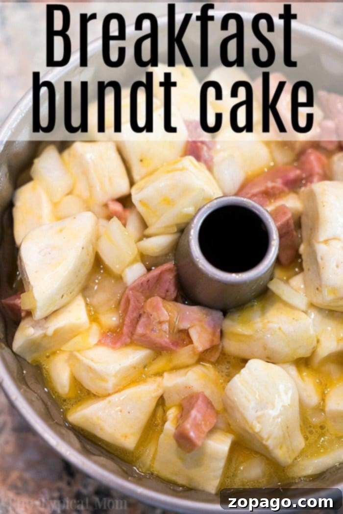 Pressure cooker breakfast bundt cake full of eggs, biscuits, ham & more! Load it up and enjoy it for brunch. 30 minutes in your Instant Pot! #pressurecooker #instantpot #breakfast #cake #bundtcake #egg #brunch #bread instant pot breakfast bundt cake