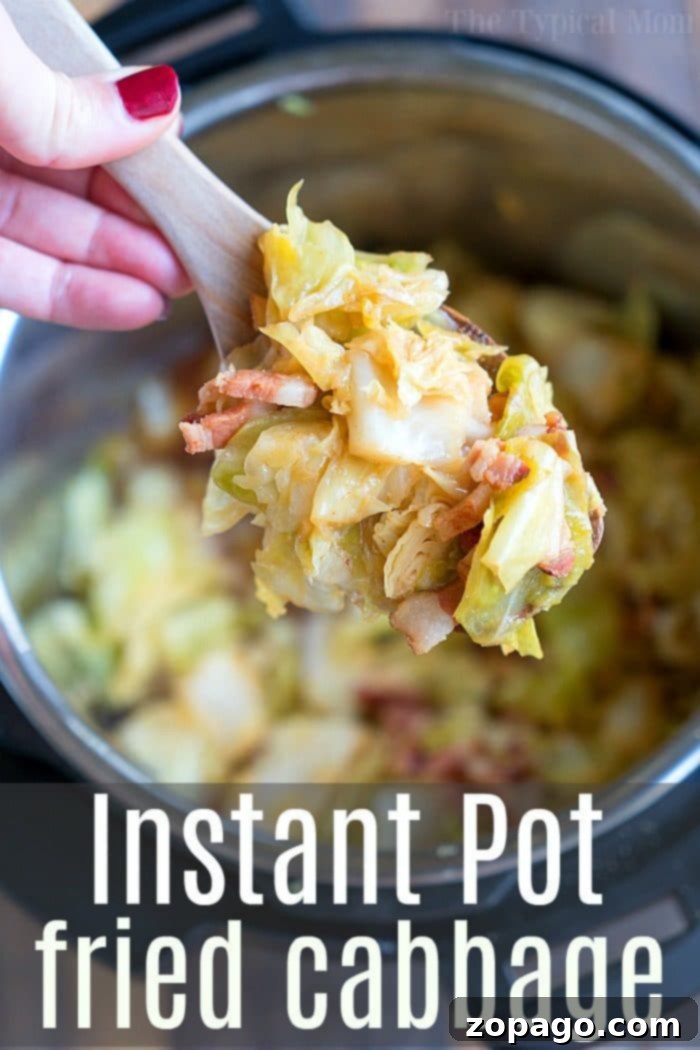 Pressure cooker fried cabbage is amazing! If you love cabbage and bacon you will enjoy this. Love my Instant Pot! #instantpot #instantpotrecipes #pressurecooker #bacon #friedcabbage #cabbage #thetypicalmom A bowl of pressure cooker fried cabbage, showcasing its tender texture and vibrant color, ready to be enjoyed as a side dish.