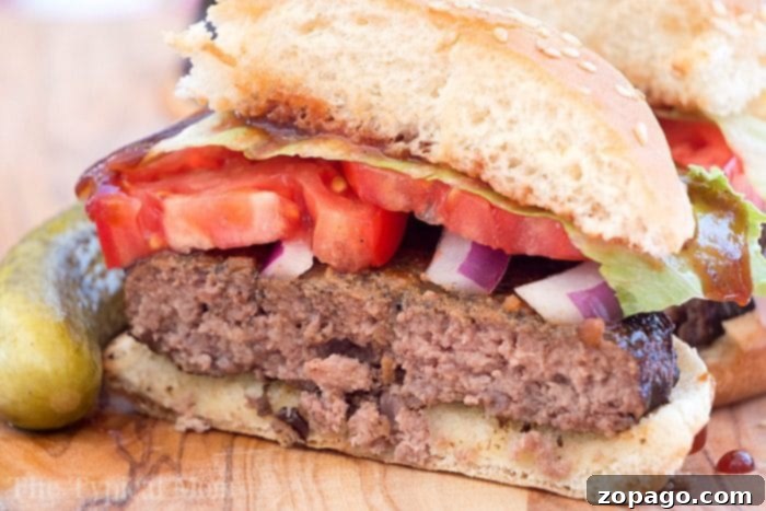Ultimate Traeger Smoked Burgers 6 Smoked Burgers Recipe 2 - Plated smoked burger ready to be enjoyed.