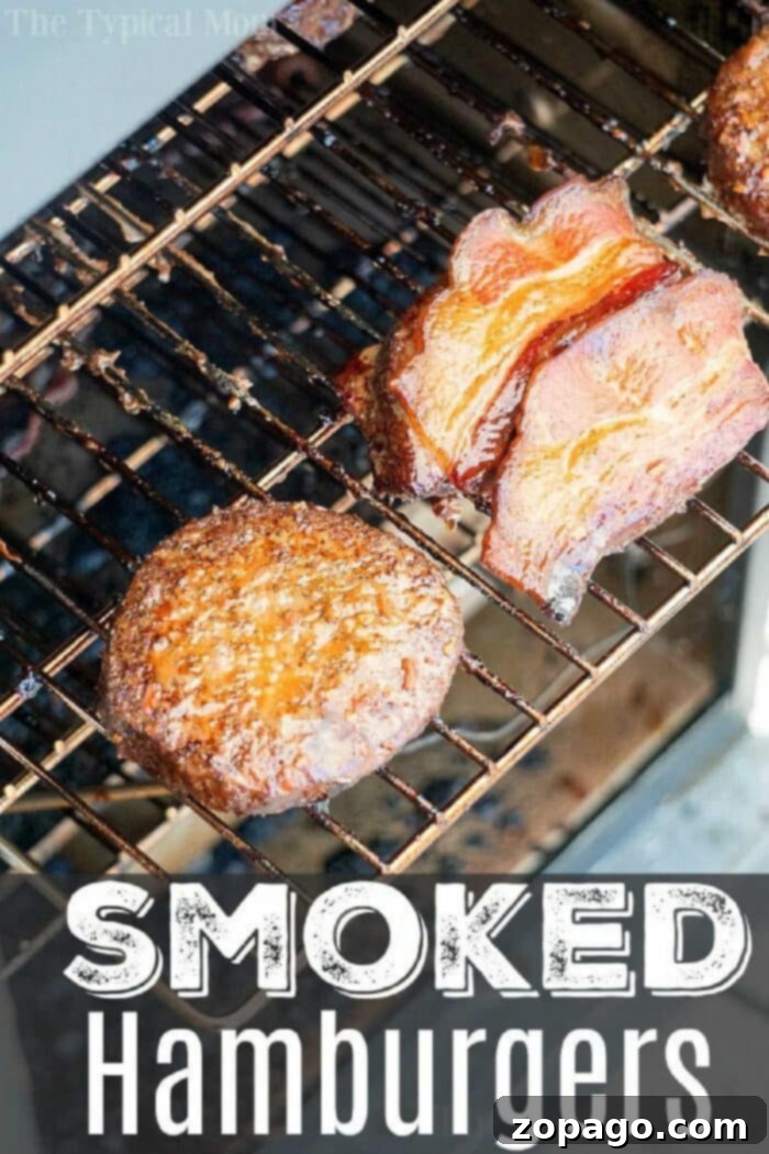 Traeger Smoked Burgers with Fresh Toppings Two perfectly cooked Traeger Smoked Burgers with a vibrant array of fresh toppings.