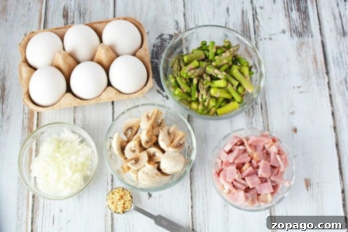 Irresistible Asparagus Casserole: A cheesy, comforting breakfast bake perfect with ham. A close-up shot of a baked Asparagus Casserole, showcasing its golden crust and delicious, cheesy interior, ready to be served for breakfast or brunch.