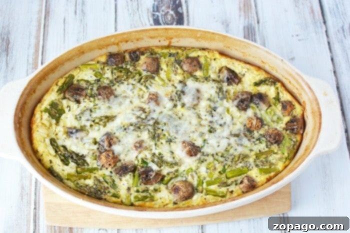 A delicious, golden-brown asparagus casserole, perfect for any breakfast or brunch table. A perfectly baked asparagus casserole, golden brown and cheesy, fresh out of the oven, ready to be enjoyed.