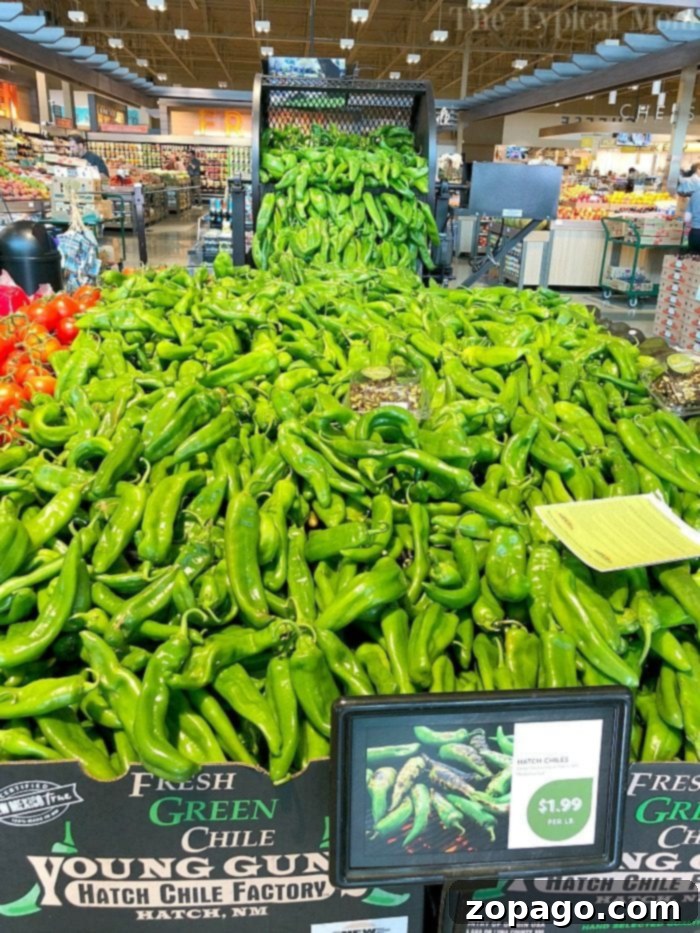 Smoked chiles are great on burgers and in casseroles! Using fresh hatch chiles the smoked taste brings it to a whole new level of yum! #smoked #chiles #hatch #recipes #hatchchiles #smokedchiles Fresh Hatch Chiles ready for smoking, showcasing their vibrant green color