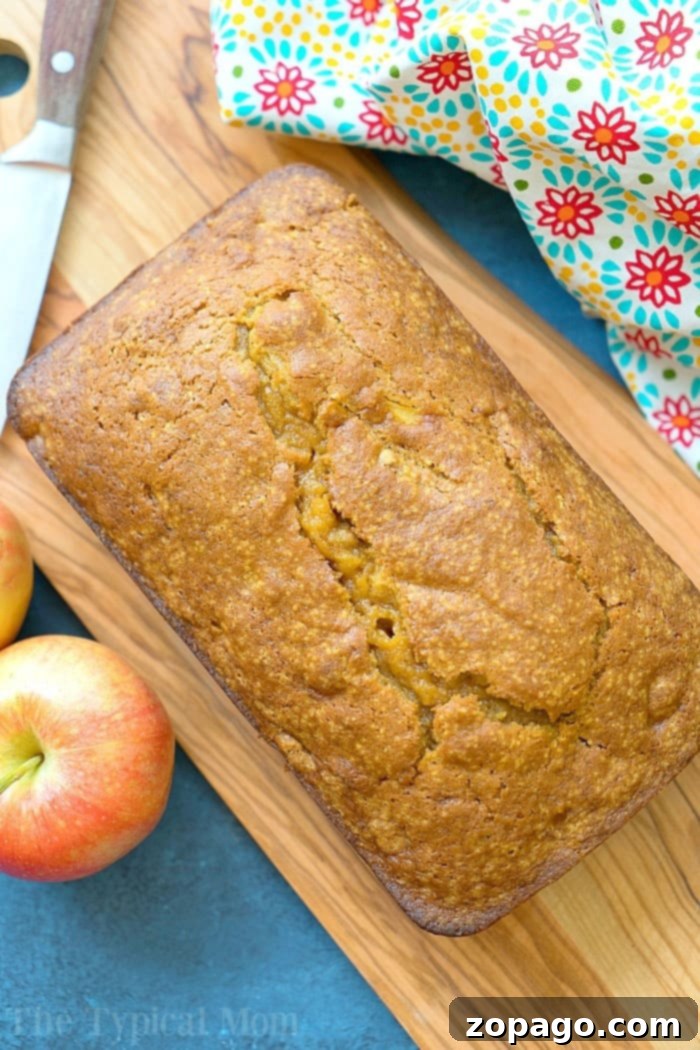A loaf of easy pumpkin apple bread, perfect for breakfast or dessert. easy pumpkin apple bread