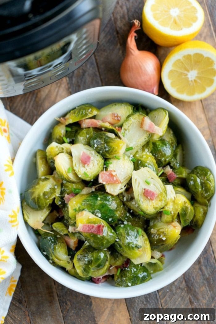 Savor the simplicity and flavor of Instant Pot brussel sprouts with bacon – a perfect, quick vegetable side dish for any occasion. #brussels #instantpot #pressurecooker #brusselsprouts #vegetables #bacon #instantpotrecipes #thetypicalmom Instant Pot Brussel Sprouts with crispy bacon and garlic butter