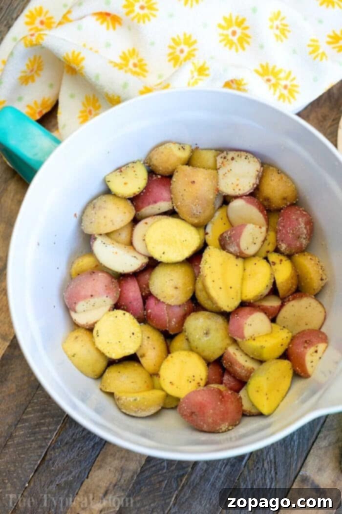 Instant Pot potatoes have never been easier to make in your pressure cooker and full of flavor with these Italian seasonings! Perfect side dish with dinner. #instantpot #pressurecooker #instantpotrecipes #potatoes #italian #diced #seasoned #sidedish Close-up of perfectly pressure cooked diced potatoes, lightly seasoned and ready to serve.