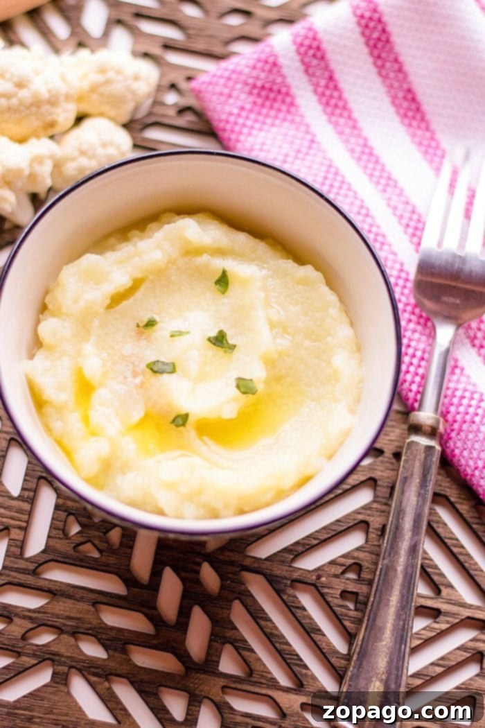 Gourmet Mashed Cauliflower with Garlic Butter and Fresh Herbs Perfectly Seasoned Mashed Cauliflower