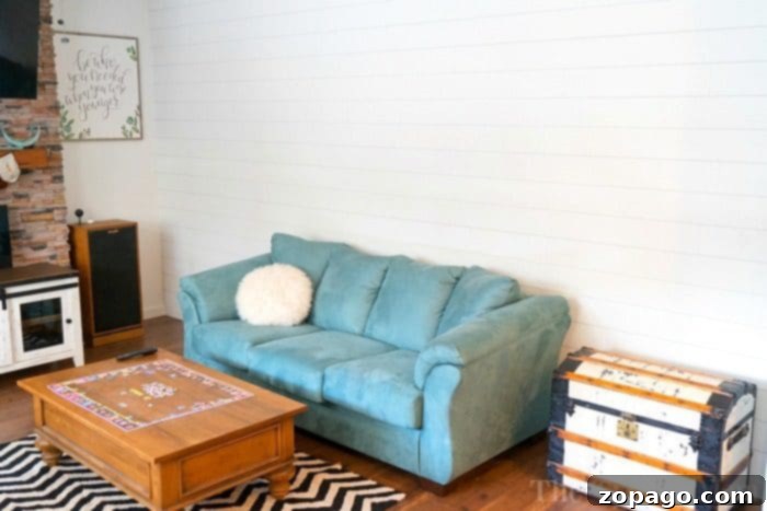Completed Shiplap Accent Wall Finished white shiplap wall, showcasing its clean lines