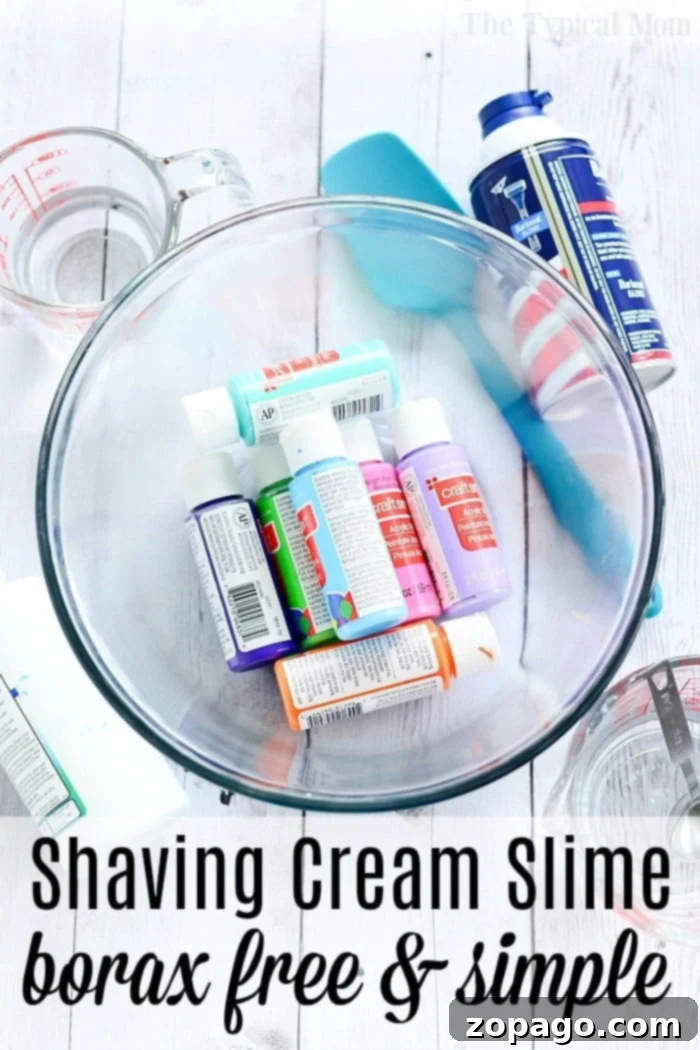 Shaving Cream Slime Large, fluffy, light blue slime stretched out, made with shaving cream for extra volume and softness.