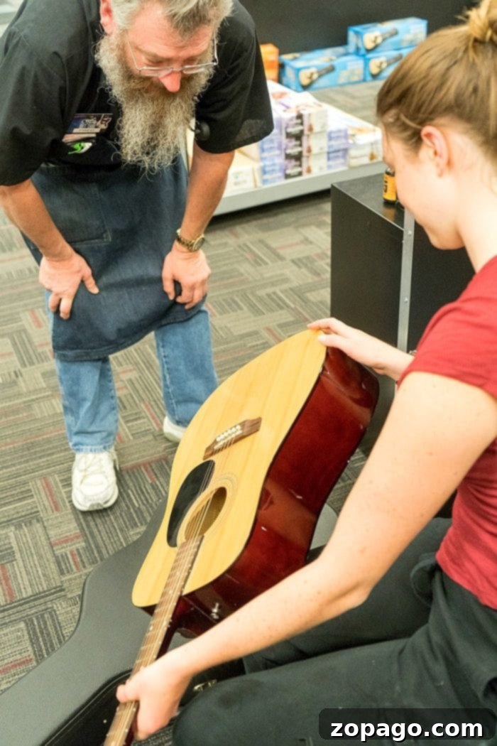 Discover Your Instrument: Explore the Extensive Collection at Guitar Center The vibrant interior of a Guitar Center store in Boise, Idaho, showcasing a wide array of guitars and musical instruments.