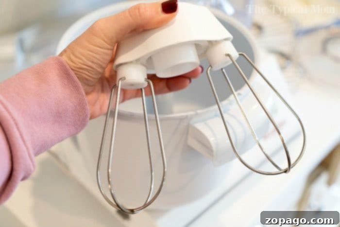 A powerful revolution mixer in action, showcasing its efficiency for preparing batters for the best zucchini bread and other baked goods.