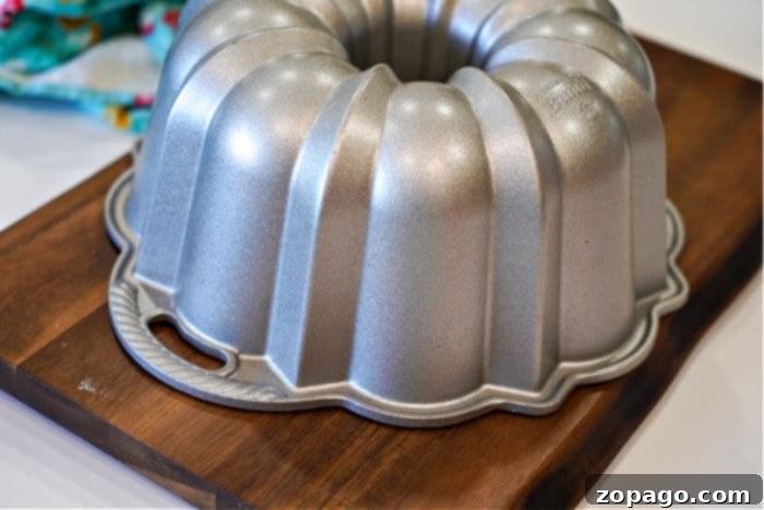 Easy 2-Ingredient Root Beer Cake 5 Bundt pan ready for baking a beautiful cake