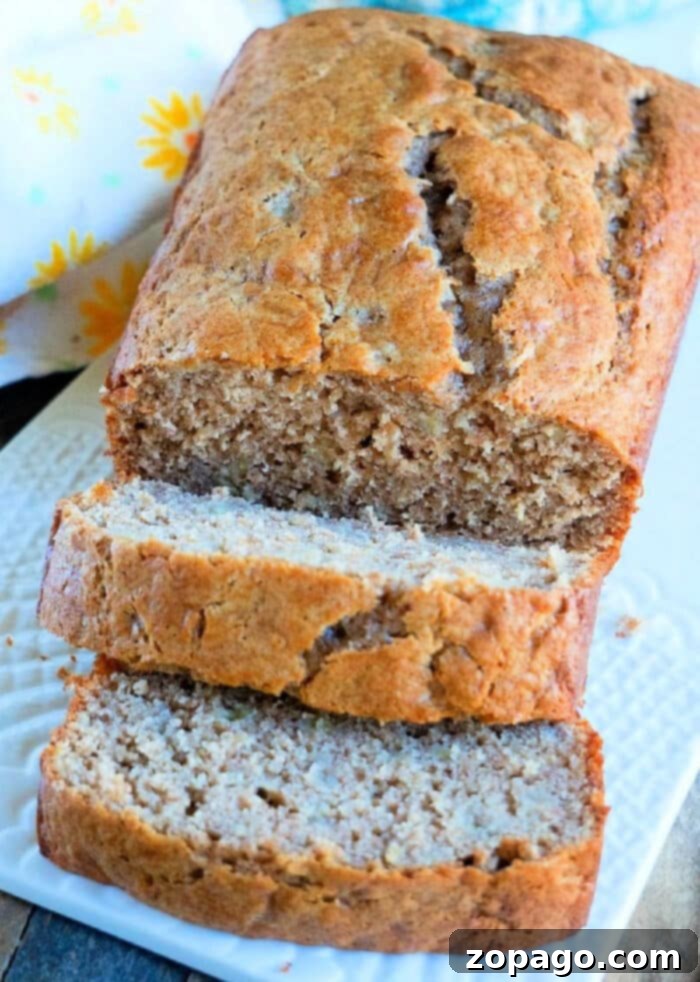 Easy 4-Ingredient Banana Bread 6 Close-up of baked banana bread made with cake mix, highlighting its texture.