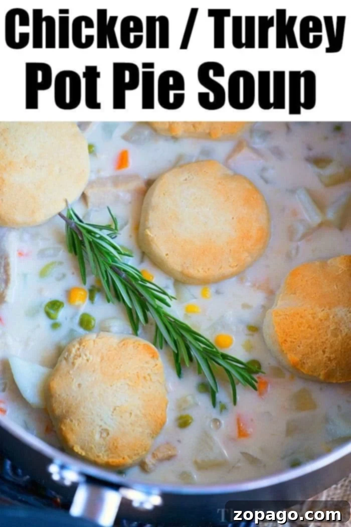 A large pot of creamy turkey pot pie soup, ready to be served, highlighting its rich texture and hearty ingredients.