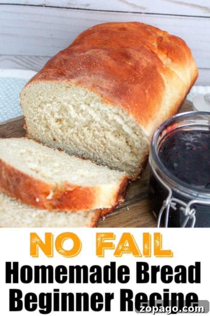 Baking bread at home isn't as scary as it sounds, and is easier to make than you probably think. If you wanna try making homemade bread here's an easy way. #homemade #bread #easy #homemadebread #whitebread #wheatbread A loaf of homemade bread with one slice cut, next to a jar of jam. Text reads: No Fail Homemade Bread Beginner Recipe for baking bread at home.