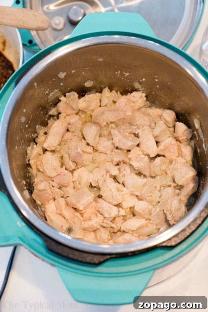 Pressure cooker sesame chicken, showing the rich, thick sauce.