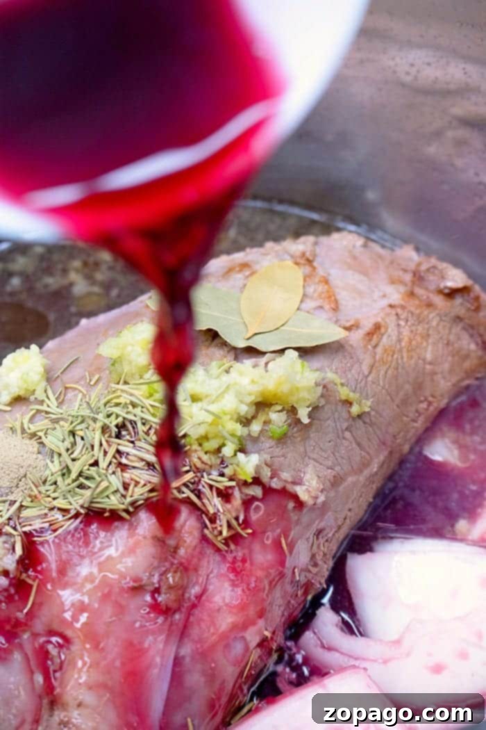 Pressure cooker roast beef is tender and full of flavor without ever having to turn on your oven! Sliced or shredded beef Instant Pot or Ninja Foodi style. Instant Pot roast beef served with root vegetables