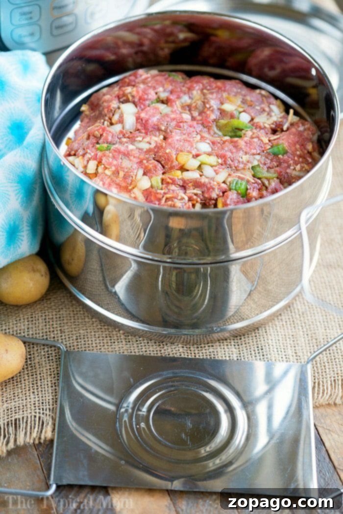 Perfectly cooked pressure cooker meatloaf and tender potatoes served together
