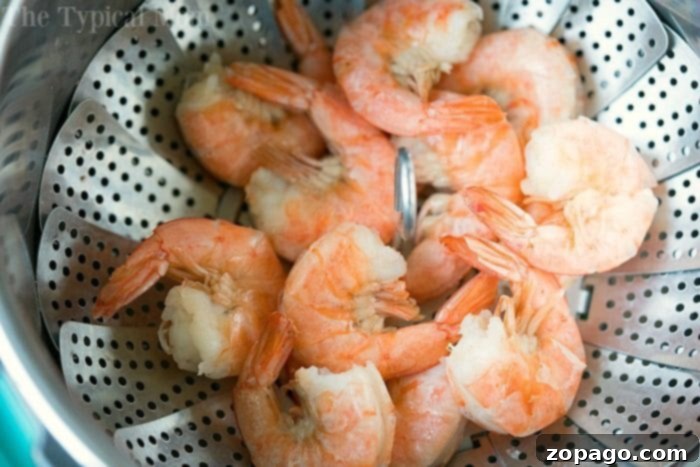 Delicious Instant Pot Shrimp A plate of freshly cooked shrimp from the Instant Pot, seasoned and ready to eat