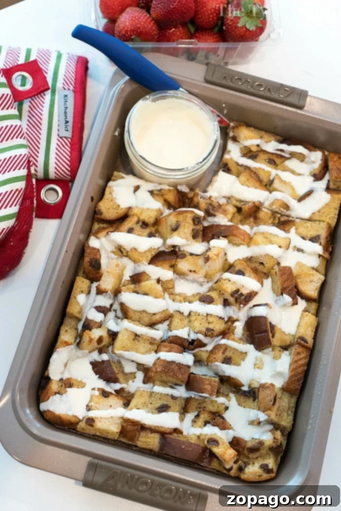Homestyle Raisin Bread Pudding 4 raisin bread pudding sliced into squares on a white platter