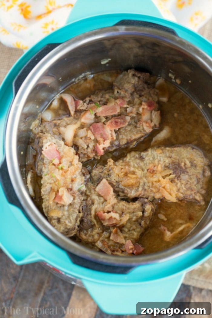 Pressure cooker liver and onions is here! If you love this classic dish you can now make it in your Instant Pot or Ninja Foodi in no time at all. pressure cooker liver and onions 2