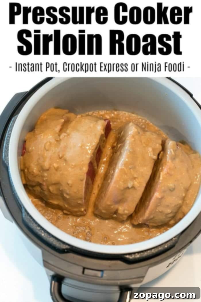 Great Ninja Foodi roast recipe with mushroom gravy that's tender and juicy in just about an hour. If you're looking for Ninja Foodi recipes you'll love this #ninjafoodirecipes #ninjafoodi #sirloinroast #roast #pressurecooker #shreddedbeef A fork effortlessly shredding a piece of Ninja Foodi Roast, illustrating the extreme tenderness achieved, perfect for a Ninja Foodi roast recipe.