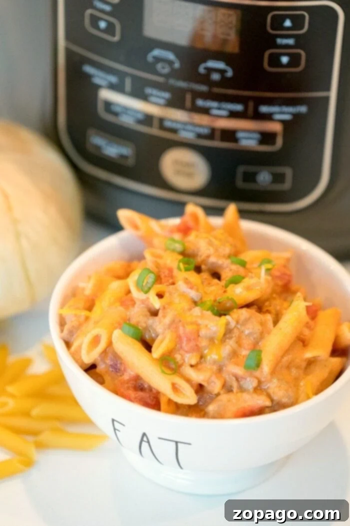 Discover the magic of Ninja Foodi recipes with this creamy, cheesy taco pasta. Overview of Ninja Foodi taco pasta in the pot and served, highlighting its ease and deliciousness.