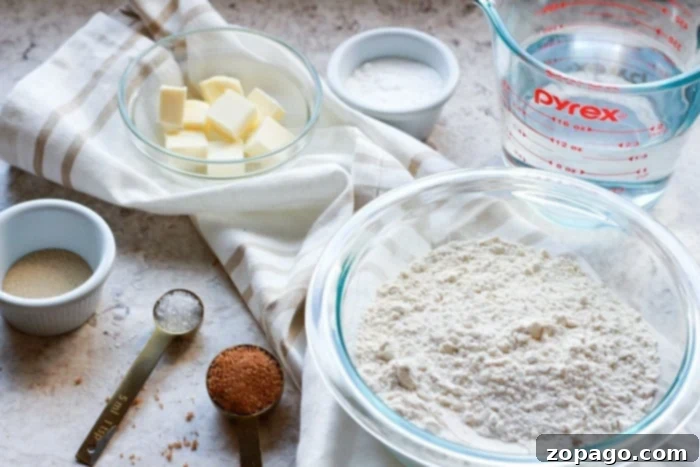 Simple ingredients for delightful air fryer pretzel bites. Key ingredients laid out for homemade air fryer pretzel bites, including flour, yeast, and salt.