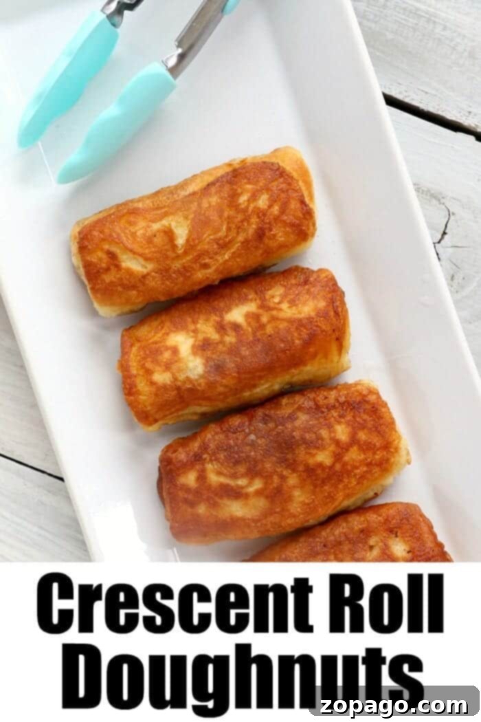 A white rectangular plate holds four golden-brown crescent roll doughnuts, dusted with sugar. A pair of tongs with turquoise handles is placed at the top of the plate. The text at the bottom of the image reads "Peanut Butter and Jelly Crescent Roll Doughnuts."