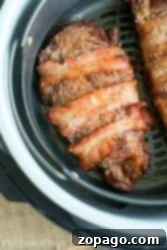 Perfect Air Fryer Steak 7 Enjoy a delectable bacon-wrapped ribeye steak, cooked to perfection inside an air fryer basket, delivering the same juicy satisfaction you’d expect from a ribeye in the air fryer.