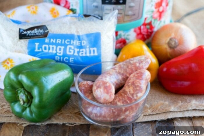 Prepped Sausage and Vegetables for Quick Jambalaya Prepped ingredients for an easy jambalaya recipe, showing sliced sausage and chopped bell peppers ready for the pressure cooker.