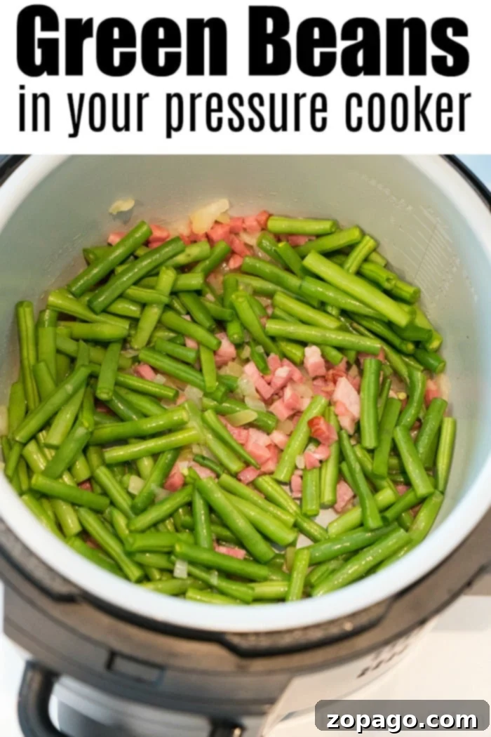 Instant Pot green beans and bacon has never been easier to make! Steaming vegetables is the best way to maintain vitamins and color. Try it this week. #ninjafoodirecipes #pressurecooker #greenbeans #vegetables instant pot green beans with crispy bacon