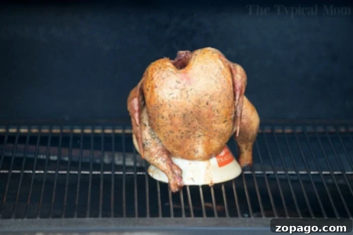 Perfecting the art of smoking a chicken Smoking a chicken on a grill