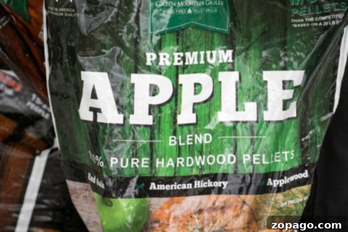 Close-up of apple wood smoker pellets, ready to infuse flavor into the turkey.