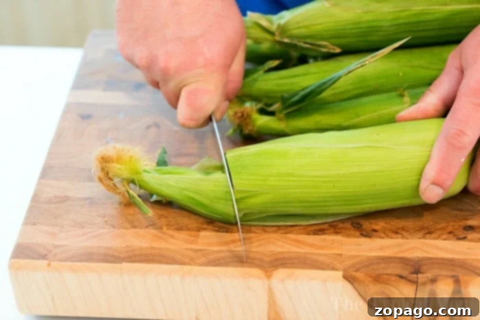 Abundance of fresh corn on the cob, ready for smoking.