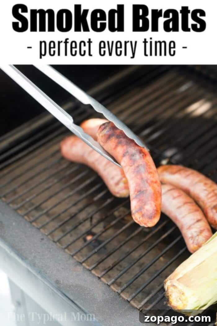 Smoked brats are a delicious lunch or dinner idea you can make in your pellet or electric smoker this week! If you haven't smoked sausage yet, try this! #smokerrecipes #smoked #smoker #sausage #brats #traeger Plated smoked brats on buns with toppings