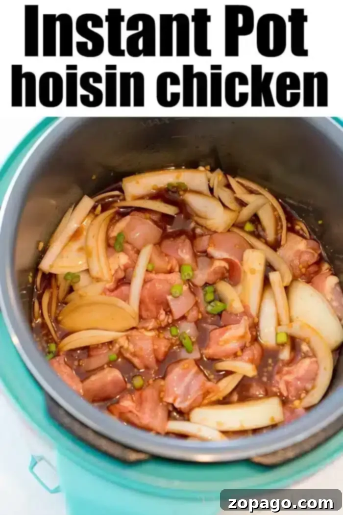 An Instant Pot filled with raw hoisin chicken, sliced onions, and chopped green onions marinating in a rich, dark sauce, ready for pressure cooking.