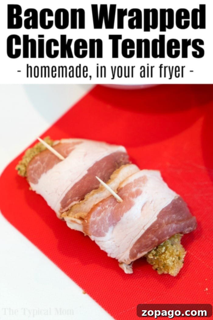 Homemade air fryer chicken strips wrapped in bacon are here for you to enjoy tonight! Easy 20 minute air fryer dinner idea even the kids will love. #airfryerrecipes #airfryer #ninjafoodi #chickentenders #chicken #homemade #chickenstrips #thetypicalmom #bacon Two air fryer chicken tenders wrapped in bacon, secured with toothpicks, on a cooling rack